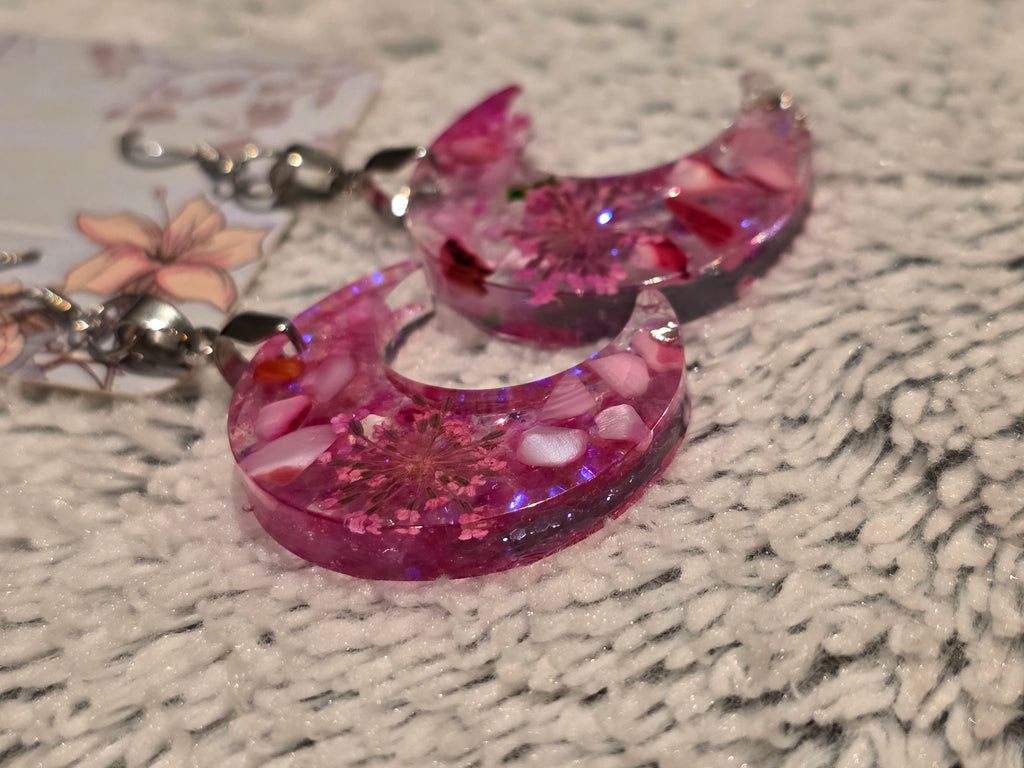 Resin earrings – pink crescent moons with glitter effect, stainless-steel hooks
