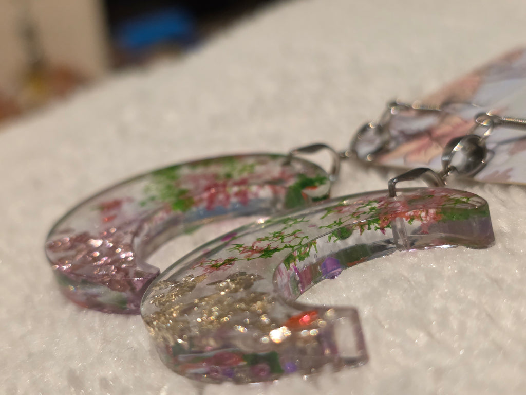 Resin earrings – clear crescent moons with real dried flowers, stainless-steel hooks