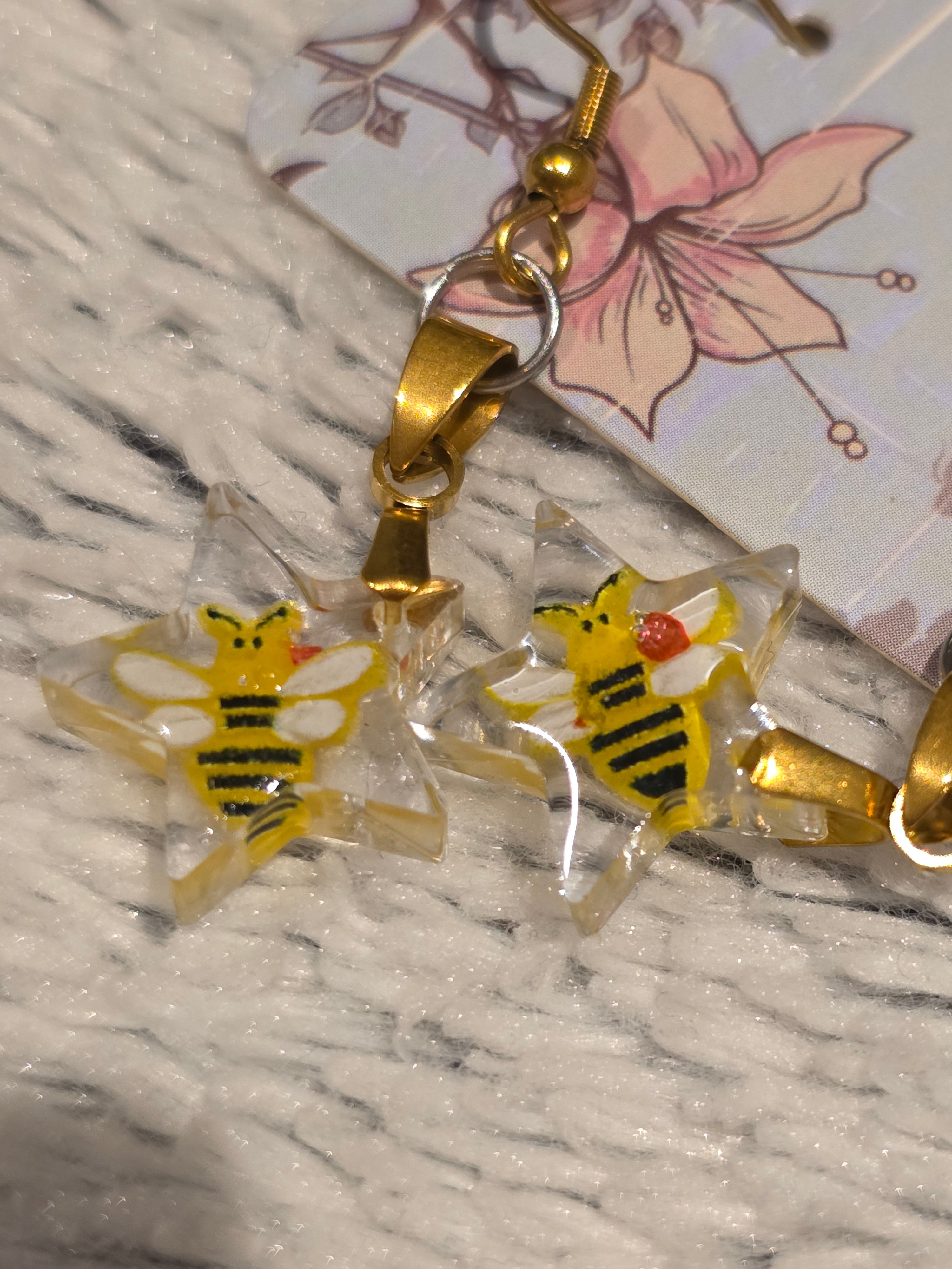 Resin earrings – star charms with bees, gold hooks