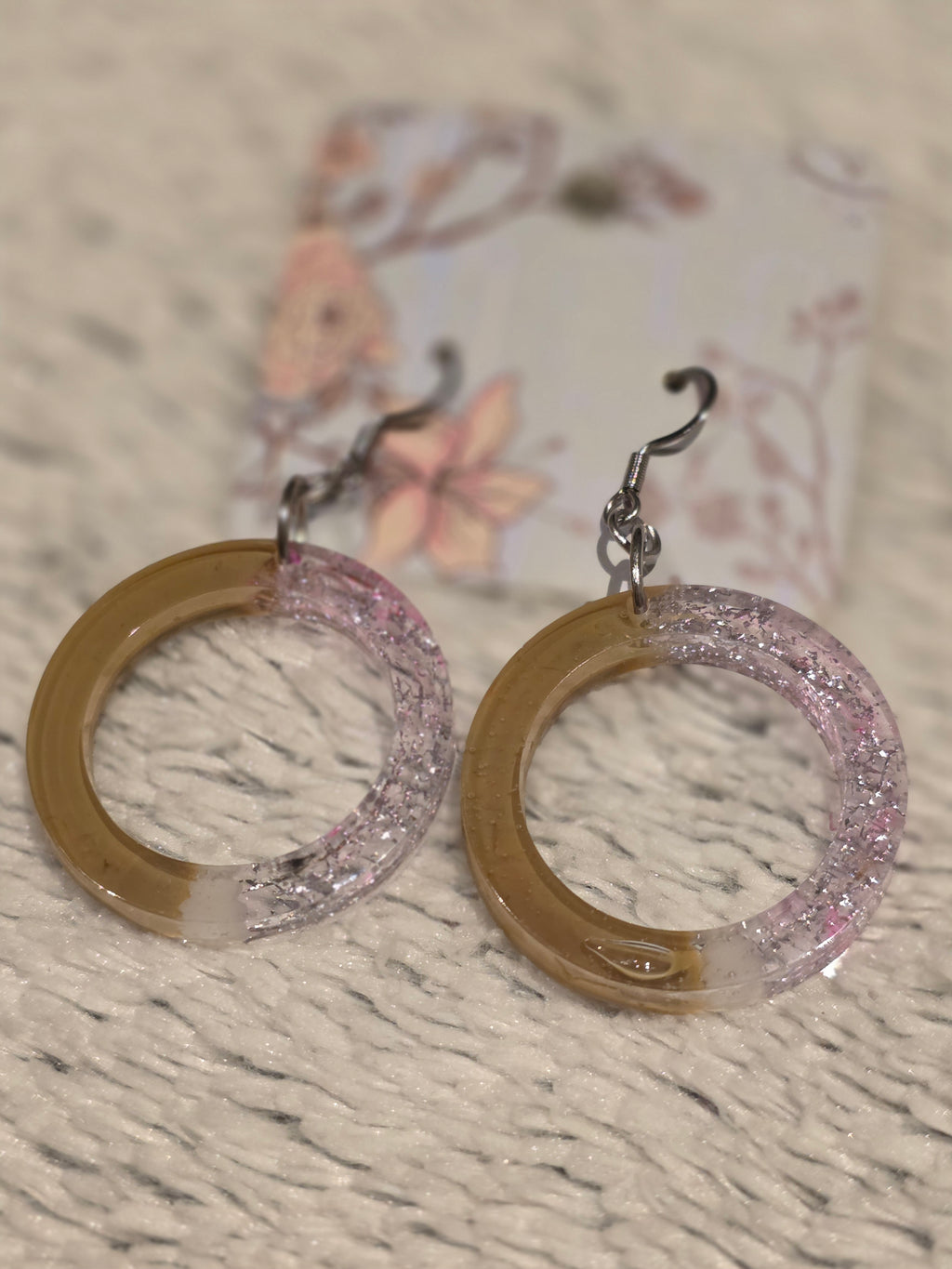 Resin earrings – clear hoops with gold pigment and silver glitter effect, stainless-steel hooks