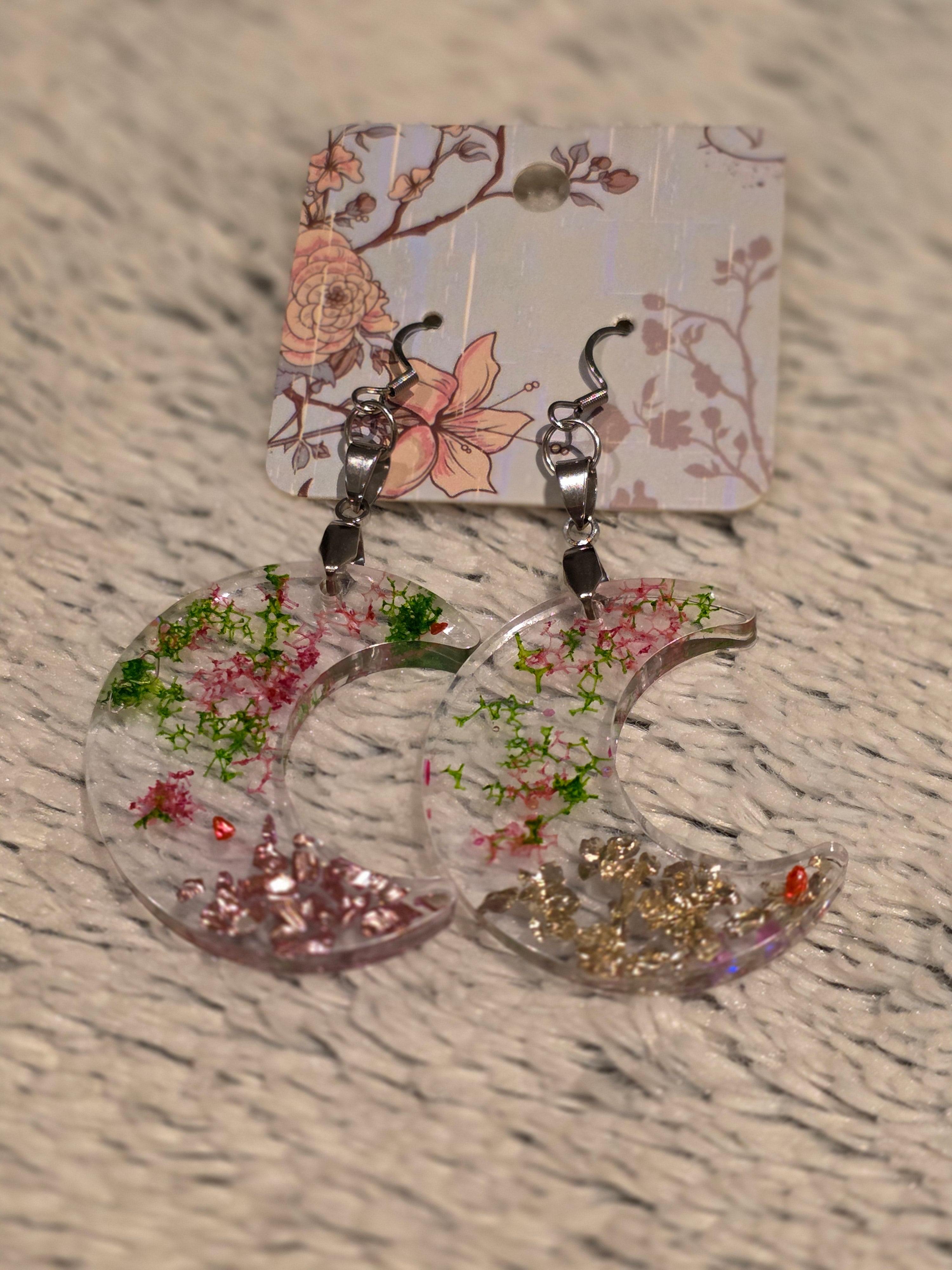 Resin earrings – clear crescent moons with real dried flowers, stainless-steel hooks
