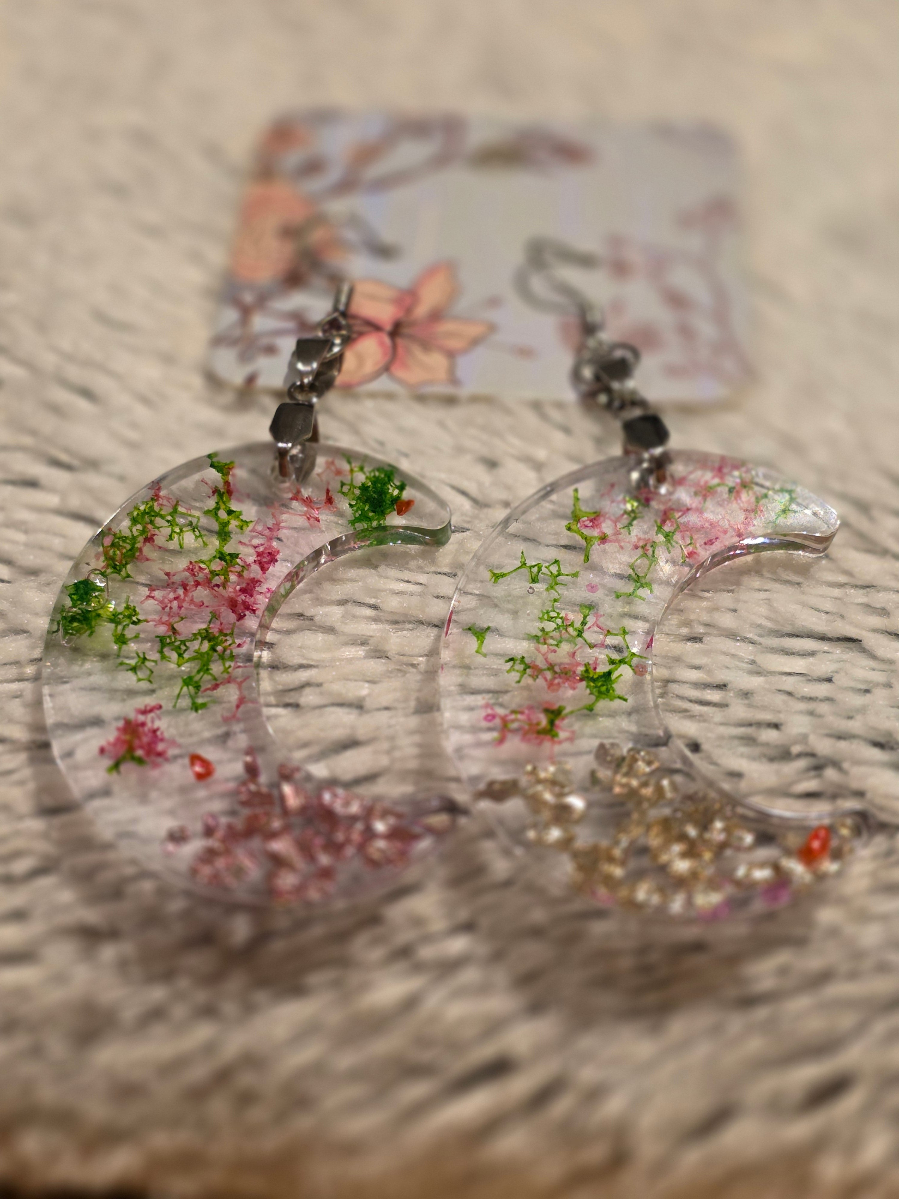 Resin earrings – clear crescent moons with real dried flowers, stainless-steel hooks