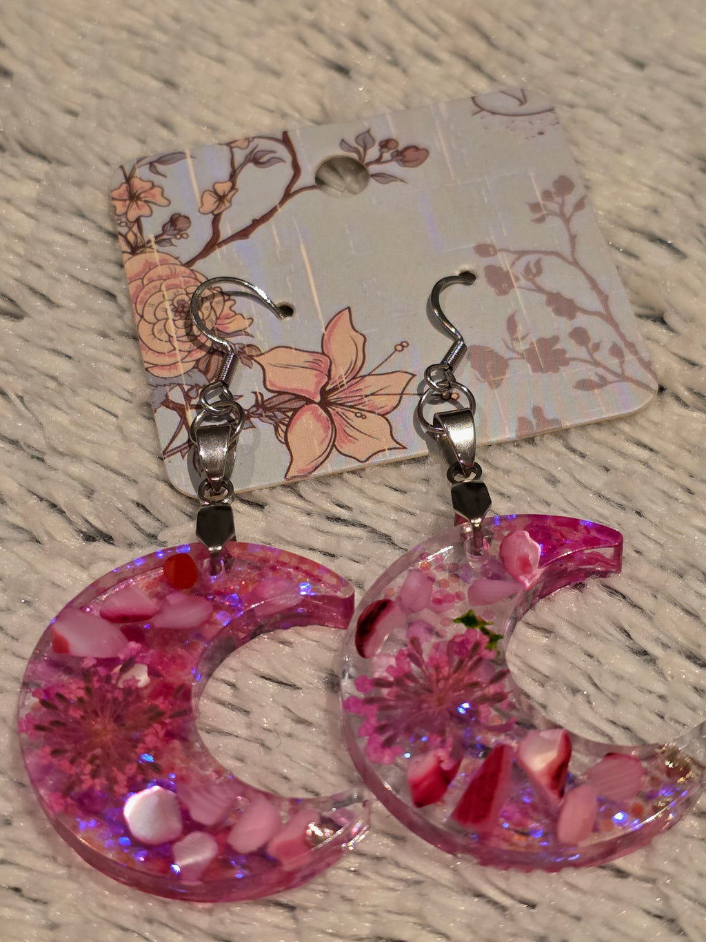 Resin earrings – pink crescent moons with glitter effect, stainless-steel hooks
