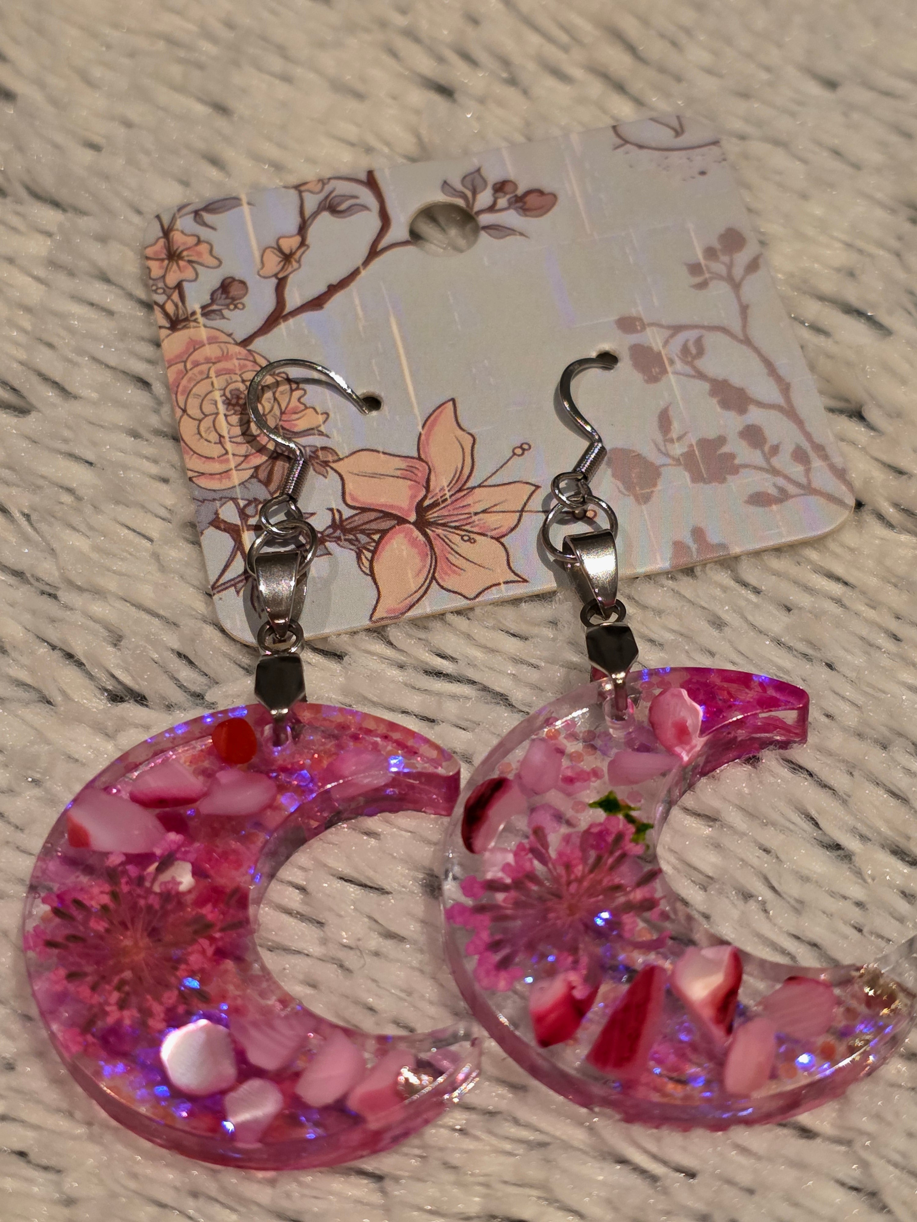 Resin earrings – pink crescent moons with glitter effect, stainless-steel hooks